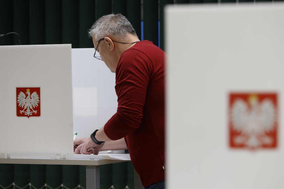 Poles vote in a high-stakes election that will determine whether right-wing party stays in power Poles vote in a high-stakes election that will determine whether right-wing party stays in power
