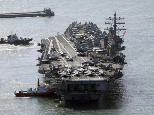 US aircraft carrier arrives in South Korea as North’s leader Kim exchanges messages with Putin