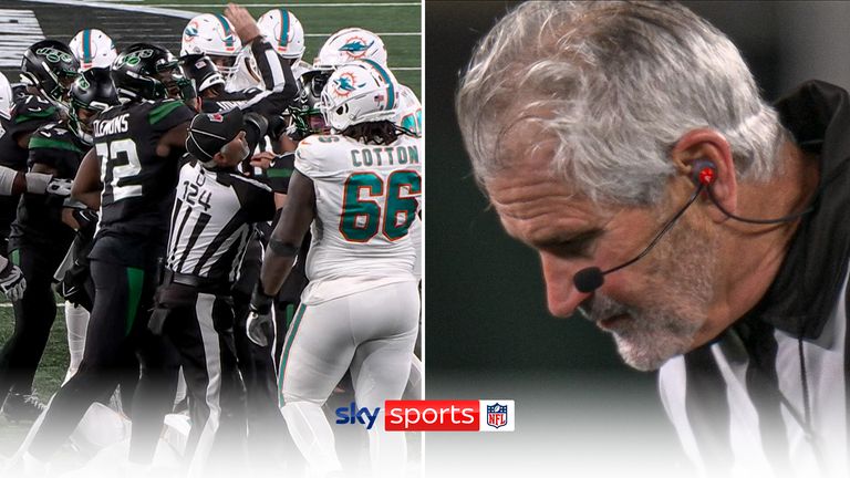 Official spits blood after getting hit in Miami Dolphins-New York Jets brawl | Video | Watch TV Show Official spits blood after getting hit in Miami Dolphins-New York Jets brawl | Video | Watch TV Show