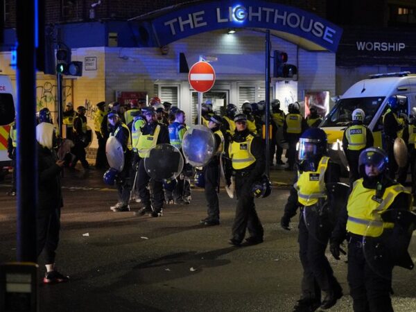 Four police officers injured in south London clash