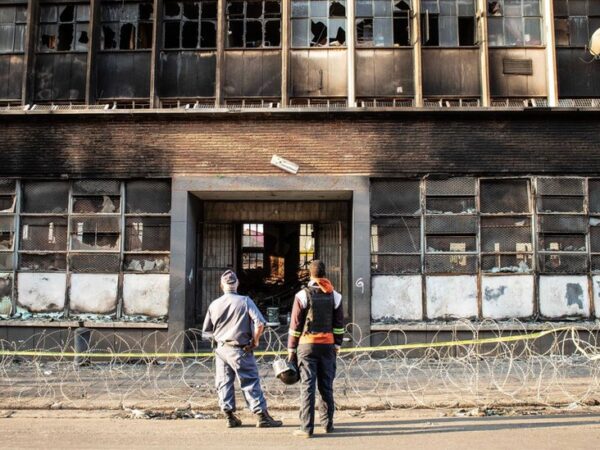 Man held for murder over South Africa building fire