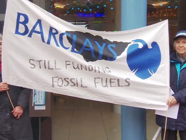 Anti-war and environmental groups protest outside Barclays bank