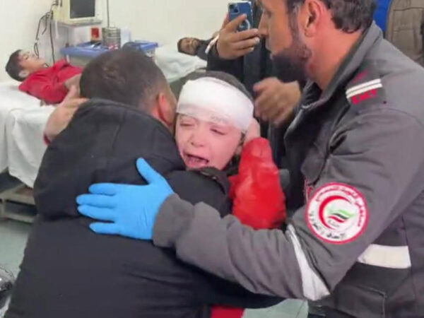 Gaza doctor breaks down in tears seeing his injured son brought into the ER