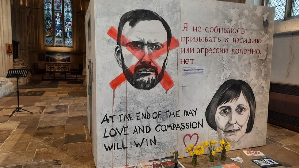 Navalny tributes left at cell replica installation Navalny tributes left at cell replica installation