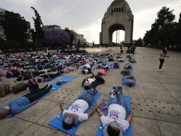 Hundreds of people in Mexico City stretch out for a ‘mass nap’ to commemorate World Sleep Day