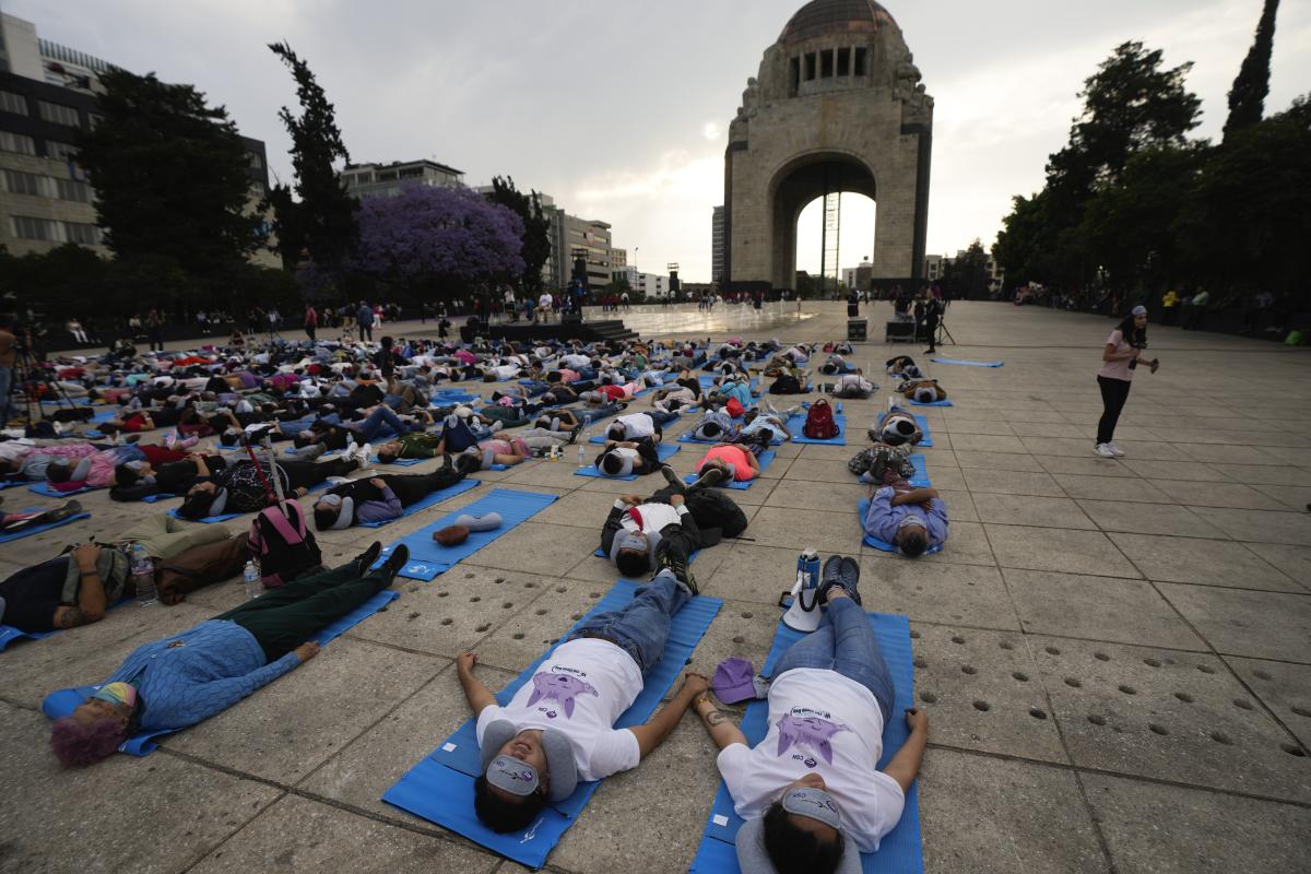 Hundreds of people in Mexico City stretch out for a ‘mass nap’ to commemorate World Sleep Day