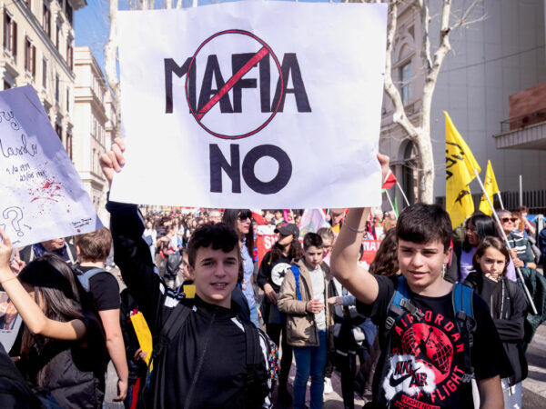 Italy expands controversial program to take kids from mafia families