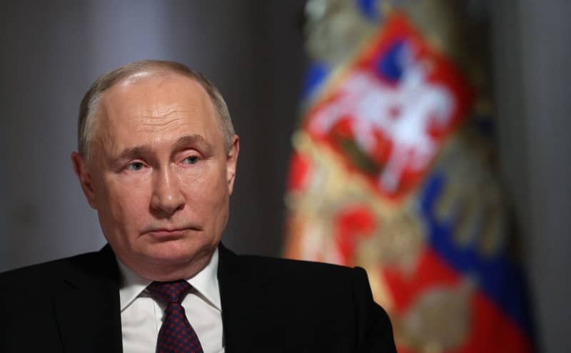 Putin opponents face threats as Russian presidential poll continues Putin opponents face threats as Russian presidential poll continues