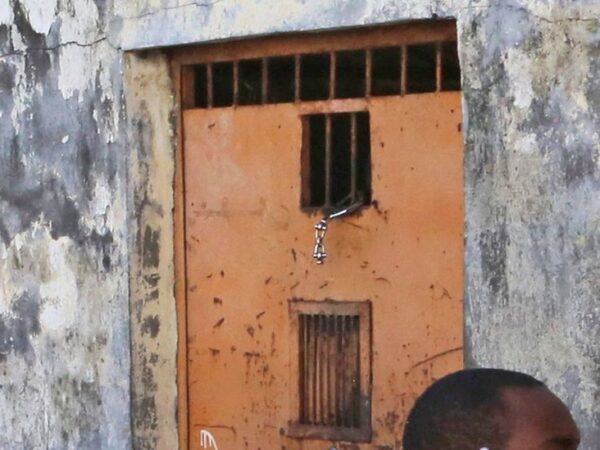 Dozens of prisoners walk out of prison