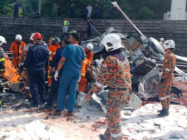 Malaysian Navy Helicopters Collide Midair, Killing 10