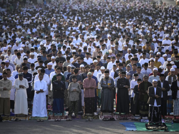 Muslims celebrate Eid al-Fitr with family reunions, new clothes, treats and prayers