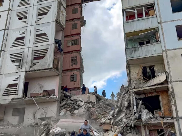 An apartment block collapses in a Russian border city after heavy shelling, with deaths reported