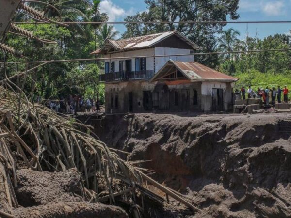 Cold lava sweeps villages near volcano, killing 37