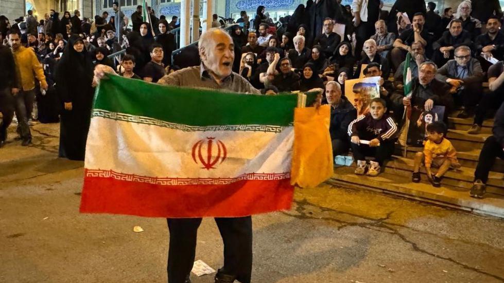 Crowds gather ahead of Iranian president’s funeral