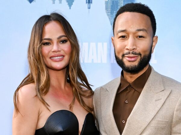 John Legend Reveals How Wife Chrissy Teigen Hurt Her Neck After ‘Trying to Be an Acrobat’ (Exclusive)