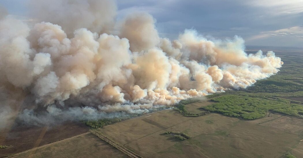 Minnesota and Wisconsin See Air Quality Warnings as Canadian Wildfire Smoke Drifts South Minnesota and Wisconsin See Air Quality Warnings as Canadian Wildfire Smoke Drifts South