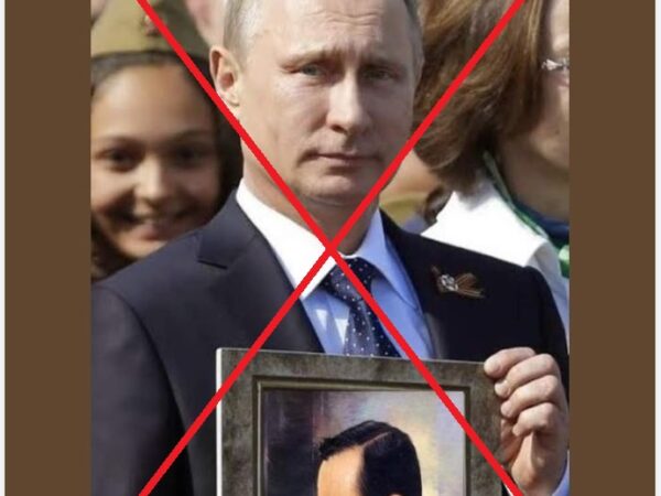 Russia’s Putin held portrait of father, not Thai king