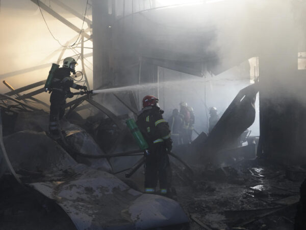 The death toll in Kharkiv attack rises to 14 as Zelenskyy warns of Russian troop movements