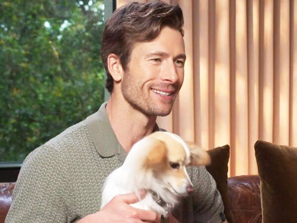 Glen Powell’s Dog Brisket Takes Over His ‘Hit Man’ Interview (Exclusive)