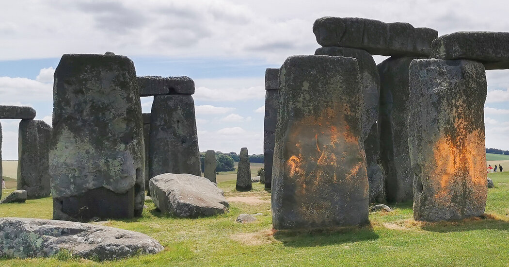 Stonehenge Is Sprayed With Orange Powder in Climate Protest Stonehenge Is Sprayed With Orange Powder in Climate Protest