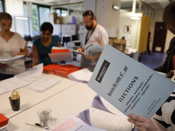 The Latest | France begins pivotal runoff elections that could propel the far right to power