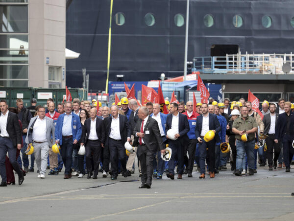 Germany’s Scholz pledges that his government will help rescue a troubled cruise ship maker