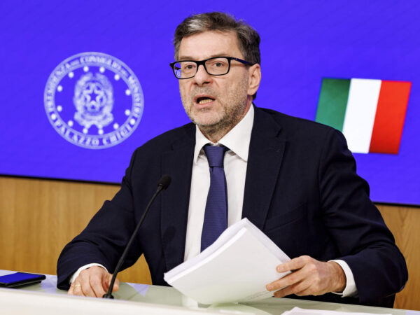 Italy approves tight budget partly funded by a levy on banks and insurers