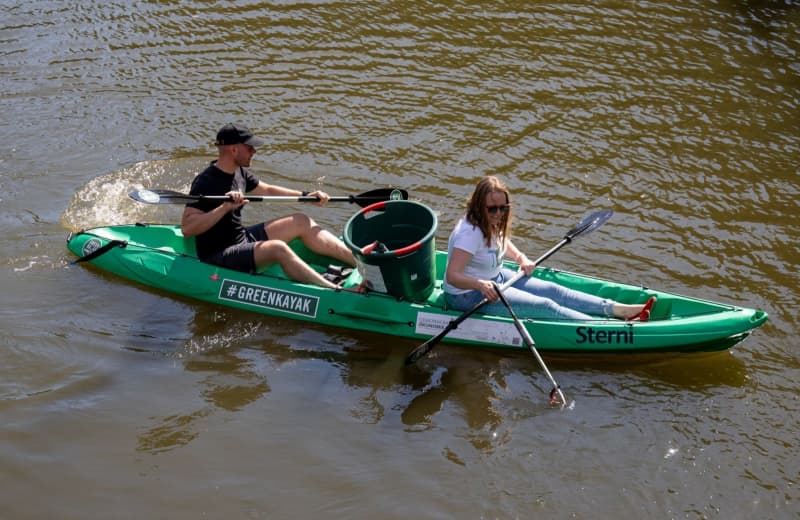 People are paddling along the world’s waterways picking up trash