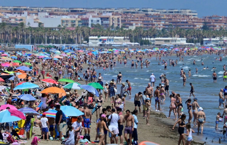 Spain logs record summer tourism as inflow draws protests