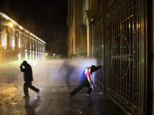 Georgian President Pledges to Stay On After Violent Clashes