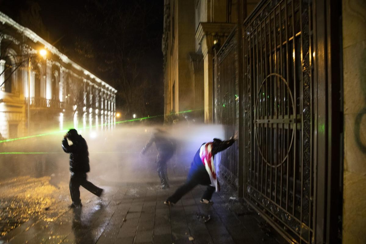 Georgian President Pledges to Stay On After Violent Clashes