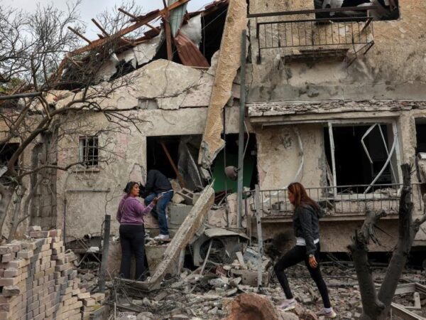 Hezbollah fires rocket barrages into Israel after deadly Beirut strikes