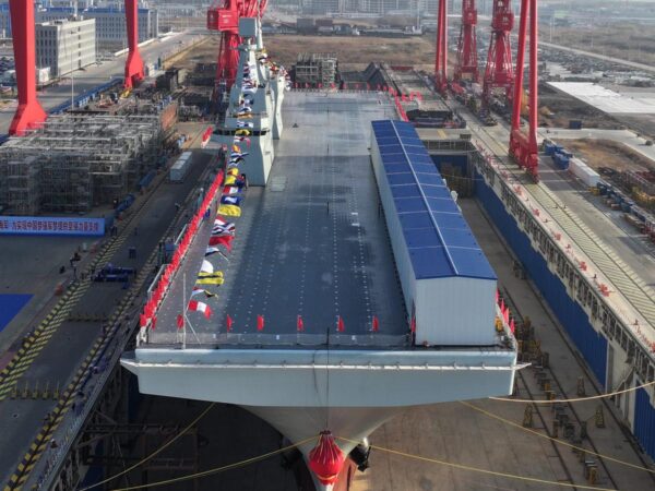 See aboard China’s new massive assault ship that can launch fighter jets or drones