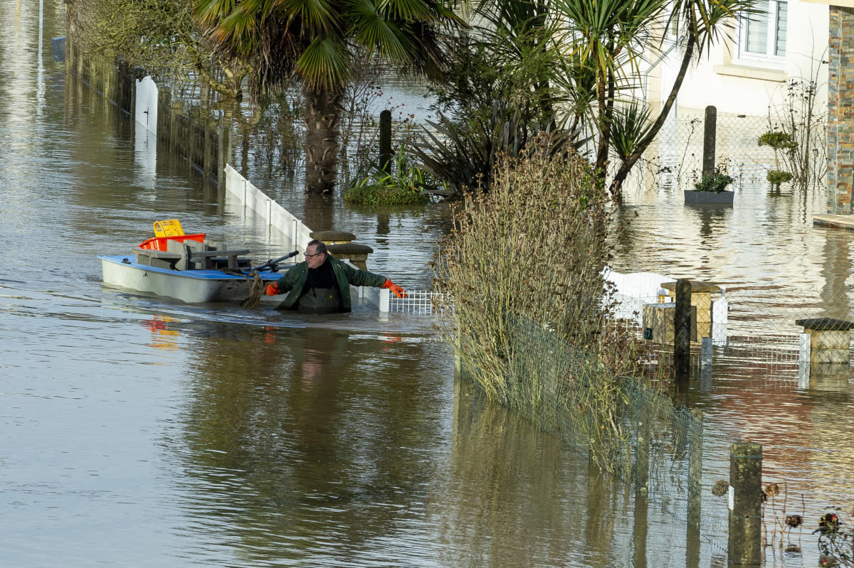 French residents rescued from flooded homes by boat as Storm Herminia hits Normandy and Brittany French residents rescued from flooded homes by boat as Storm Herminia hits Normandy and Brittany