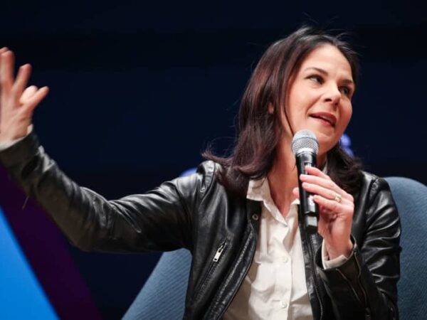 Germany’s Baerbock says her Green Party remains united on migration