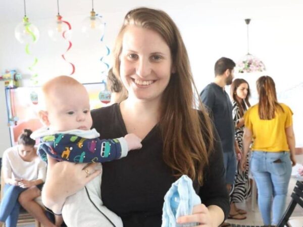 Israel says checking claims new body handed to Red Cross is Shiri Bibas