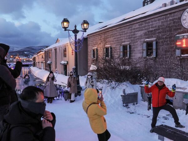 This snowy Japanese town represents love. But overtourism is turning the sweetness sour